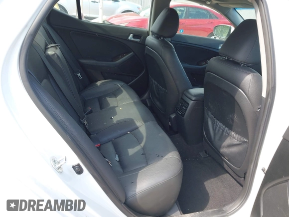 2015 Kia Optima EX with VIN 5XXGN4A77FG497218, listed as a IAAI auction lot 42464839 with 128,355 mi miles and . Bid and sale history available at DreamBid. Image 8.