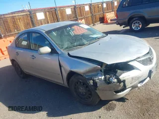 2006 Mazda Mazda3 i with VIN JM1BK12G261477521, listed as a IAAI auction lot 41275792 with 201,642 mi miles. Bid and sale history available at carsss.com. Image 1.