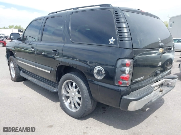 2005 Chevrolet Tahoe Z71 with VIN 1GNEC13T35R243319, listed as a IAAI auction lot 42021248 with 301,747 mi miles. Bid and sale history available at carsss.com. Image 3.