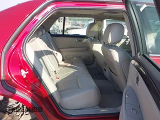 2008 Cadillac DTS 1SC with VIN 1G6KD57Y08U143396, listed as a IAAI auction lot 40618555 with 124,706 mi miles and . Bid and sale history available at carsss.com. Image 8.