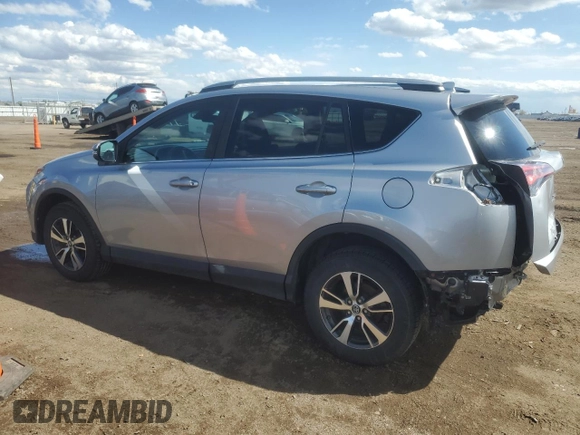 2018 Toyota RAV4 XLE with VIN 2T3RFREV2JW699448, listed as a Copart auction lot 55345975 with 46,437 mi miles and Salvage Title. Bid and sale history available at DreamBid. Image 2.