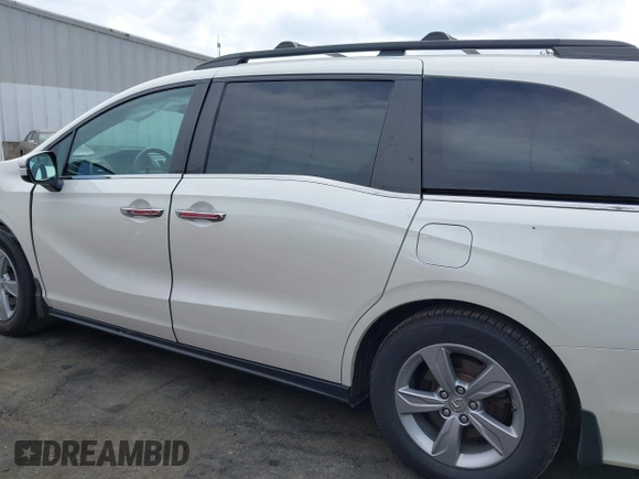 2018 Honda Odyssey EX-L with VIN 5FNRL6H77JB047919, listed as a IAAI auction lot 42112505 with 108,706 mi miles and . Bid and sale history available at DreamBid. Image 14.