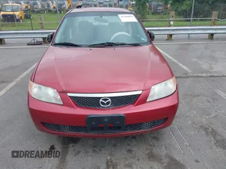2002 Mazda Protege DX z VIN JM1BJ225821586258, wystawiony jako IAAI lot #42366064 z przebiegiem 167 332 mil mil oraz . Historia ofert i sprzedaży dostępna na DreamBid. Obrazek 12.