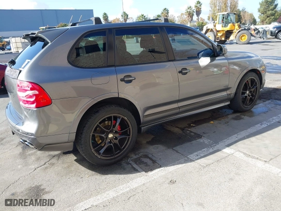 2009 Porsche Cayenne GTS with VIN WP1AD29P49LA61351, listed as a IAAI auction lot 40810730 with 213,628 mi miles. Bid and sale history available at carsss.com. Image 4.
