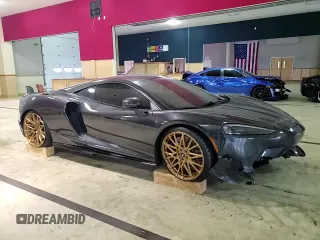 2023 McLaren GT z VIN SBM22GCAXPW002692, wystawiony jako Copart lot #41496504 z przebiegiem Nie podano mil oraz . Historia ofert i sprzedaży dostępna na DreamBid. Obrazek 11.