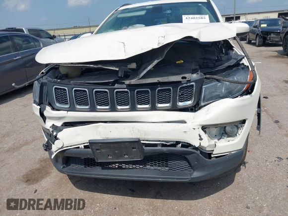 2018 Jeep Compass Altitude with VIN 3C4NJCBB1JT151808, listed as a IAAI auction lot 42402585 with 145,422 mi miles and . Bid and sale history available at DreamBid. Image 11.