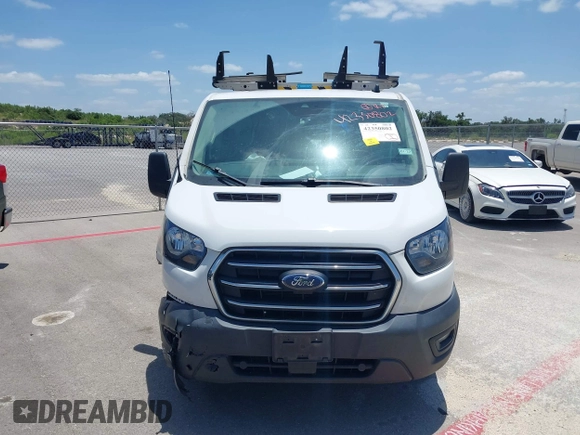 2020 Ford Transit Cargo z VIN 1FTBR1Y84LKA19741, wystawiony jako IAAI lot #42350802 z przebiegiem 90 186 mil mil oraz . Historia ofert i sprzedaży dostępna na DreamBid. Obrazek 11.