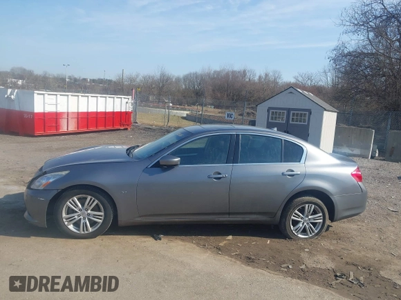 2015 Infiniti Q40 with VIN JN1CV6AR0FM521528, listed as a IAAI auction lot 41794278 with 127,821 mi miles and . Bid and sale history available at DreamBid. Image 14.