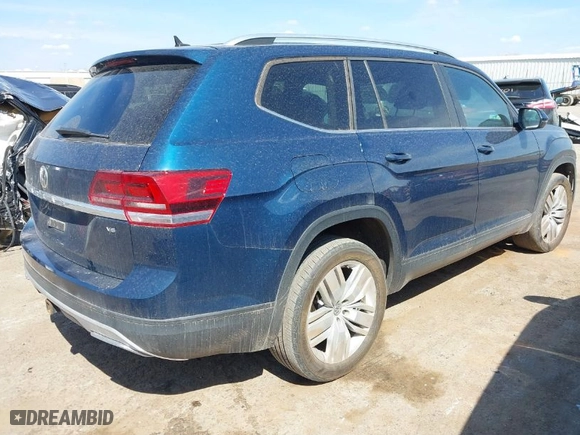 2019 Volkswagen Atlas 3.6L V6 SE w/Technology with VIN 1V2WR2CA9KC571695, listed as a IAAI auction lot 41895710 with 128,148 mi miles. Bid and sale history available at carsss.com. Image 4.