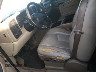 2003 GMC Yukon SLT with VIN 1GKEK13Z43R219290, listed as a Copart auction lot 69303144 with 299,023 mi miles and Salvage Title. Bid and sale history available at carsss.com. Image 7.