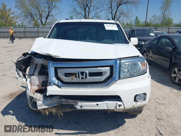 2011 Honda Pilot EX-L with VIN 5FNYF4H69BB091503, listed as a IAAI auction lot 42103011 with 246,816 mi miles and . Bid and sale history available at carsss.com. Image 12.