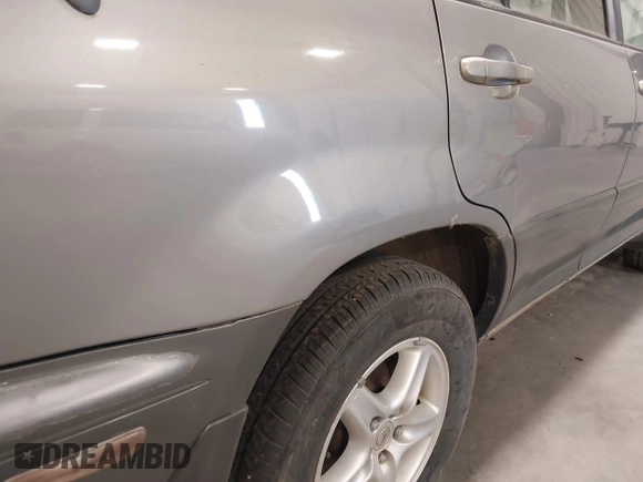 2000 Lexus RX 300 z VIN JT6HF10U6Y0129714, wystawiony jako IAAI lot #41641164 z przebiegiem 174 537 mil mil oraz . Historia ofert i sprzedaży dostępna na DreamBid. Obrazek 12.