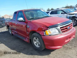 2000 Ford F-150 XL with VIN 2FTRX17W2YCA79002, listed as a IAAI auction lot 41605570 with 322,154 mi miles. Bid and sale history available at carsss.com. Image 1.