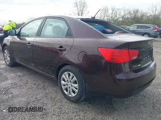 2011 Kia Forte EX with VIN KNAFU4A2XB5444513, listed as a IAAI auction lot 42002807 with 233,408 mi miles. Bid and sale history available at carsss.com. Image 3.