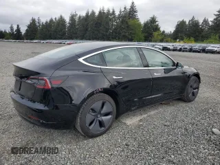 2019 Tesla Model 3 Mid Range z VIN 5YJ3E1EA2KF361787, wystawiony jako Copart lot #56059465 z przebiegiem 50 186 mil mil oraz Szkody całkowita. Historia ofert i sprzedaży dostępna na DreamBid. Obrazek 3.