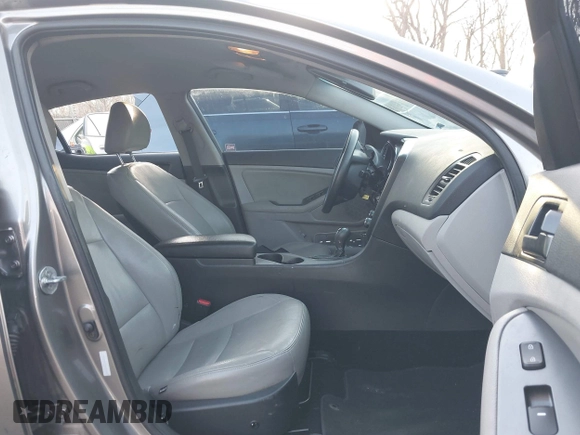 2013 Kia Optima LX with VIN 5XXGM4A77DG166140, listed as a IAAI auction lot 41881144 with 185,391 mi miles. Bid and sale history available at carsss.com. Image 5.