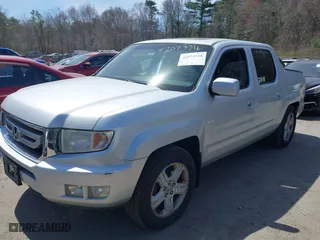 2009 Honda Ridgeline RTL with VIN 5FPYK16549B104258, listed as a IAAI auction lot 42073316 with 88,507 mi miles. Bid and sale history available at carsss.com. Image 2.