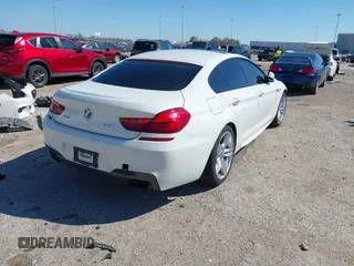 2014 BMW 6 Series 650i xDrive with VIN WBA6B4C5XED099197, listed as a IAAI auction lot 41744557 with 174,613 mi miles. Bid and sale history available at carsss.com. Image 4.