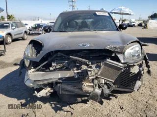 2018 MINI Countryman Cooper S with VIN WMZYT3C39J3E93214, listed as a Copart auction lot 77655444 with 101,401 mi miles and Salvage Title. Bid and sale history available at carsss.com. Image 5.