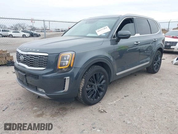 2020 Kia Telluride SX with VIN 5XYP5DHC9LG028738, listed as a IAAI auction lot 41577464 with 123,455 mi miles and . Bid and sale history available at DreamBid. Image 2.