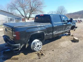 2017 GMC Sierra 2500HD SLT with VIN 1GT12TEY5HF249272, listed as a IAAI auction lot 41854590 with 134,866 mi miles. Bid and sale history available at carsss.com. Image 4.