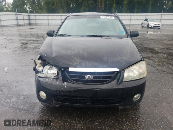 2005 Kia Spectra LX with VIN KNAFE121055134568, listed as a Copart auction lot 71541244 with 146,751 mi miles and Salvage Title. Bid and sale history available at carsss.com. Image 5.