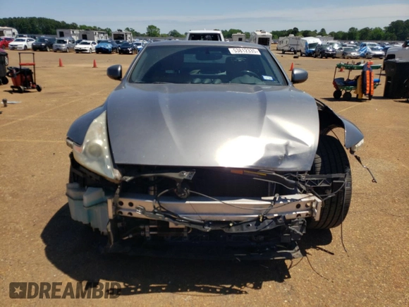 2014 Nissan 370Z Nismo with VIN JN1AZ4EH7EM633324, listed as a Copart auction lot 53812335 with 57,856 mi miles and Salvage Title. Bid and sale history available at DreamBid. Image 5.