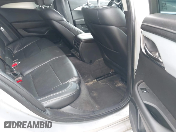 2014 Cadillac ATS Luxury AWD with VIN 1G6AH5RX8E0152449, listed as a IAAI auction lot 42081552 with 81,690 mi miles and . Bid and sale history available at DreamBid. Image 8.