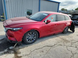 2022 Mazda CX-9 Touring с VIN JM3TCBCYXN0606213, выставлен на аукционе Copart как лот 57727175 с пробегом Не указан миль и Списание • Salvage title. История ставок и продаж доступна на DreamBid. Изображение 1.