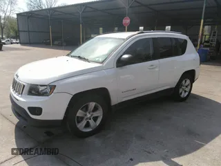 2014 Jeep Compass Sport with VIN 1C4NJDBB2ED774078, listed as a IAAI auction lot 42038110 with 104,606 mi miles. Bid and sale history available at carsss.com. Image 2.