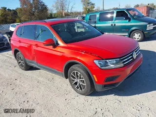 2019 Volkswagen Tiguan SE with VIN 3VV2B7AX7KM108320, listed as a IAAI auction lot 40741070 with 122,896 mi miles. Bid and sale history available at carsss.com. Image 1.