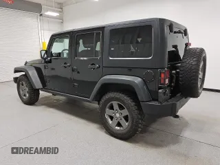 2011 Jeep Wrangler Unlimited Rubicon with VIN 1J4HA6H16BL551870, listed as a Copart auction lot 56754715 with 154,890 mi miles and Clean title. Bid and sale history available at DreamBid. Image 2.