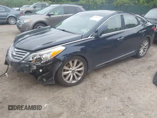 2013 Hyundai Azera with VIN KMHFH4JG5DA260461, listed as a IAAI auction lot 42603483 with 157,362 mi miles and . Bid and sale history available at DreamBid. Image 2.