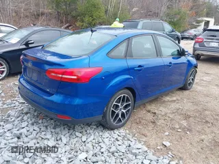 2018 Ford Focus SE z VIN 1FADP3F25JL255840, wystawiony jako IAAI lot #41852913 z przebiegiem 64 010 mil mil oraz . Historia ofert i sprzedaży dostępna na DreamBid. Obrazek 4.