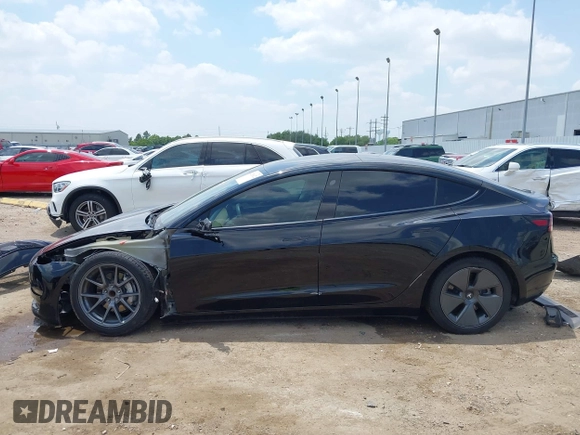 2023 Tesla Model 3 with VIN 5YJ3E1EA8PF454210, listed as a IAAI auction lot 42326822 with 43,200 mi miles and . Bid and sale history available at DreamBid. Image 15.