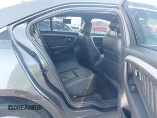 2017 Ford Taurus SEL z VIN 1FAHP2E80HG129843, wystawiony jako IAAI lot #41252910 z przebiegiem 111 923 mil mil oraz . Historia ofert i sprzedaży dostępna na DreamBid. Obrazek 8.