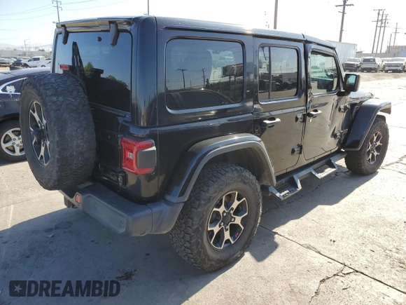 2018 Jeep Wrangler Unlimited Rubicon with VIN 1C4HJXFGXJW255881, listed as a Copart auction lot 62958975 with 39,439 mi miles and Salvage title. Bid and sale history available at DreamBid. Image 3.