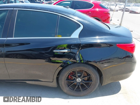 2015 Infiniti Q50 z VIN JN1BV7AP9FM335745, wystawiony jako IAAI lot #42336325 z przebiegiem 153 970 mil mil oraz . Historia ofert i sprzedaży dostępna na DreamBid. Obrazek 13.