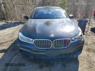 2017 BMW 7 Series 750i xDrive with VIN WBA7B0C55HG527032, listed as a Copart auction lot 52026415 with 67,722 mi miles and Clean title. Bid and sale history available at DreamBid. Image 5.