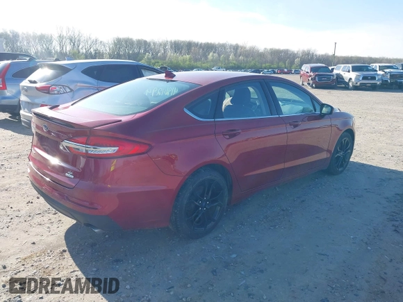 2019 Ford Fusion SE with VIN 3FA6P0HD1KR166565, listed as a IAAI auction lot 41961294 with 99,355 mi miles. Bid and sale history available at carsss.com. Image 4.