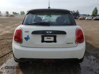 2016 MINI Hardtop with VIN WMWXP5C5XG2D15482, listed as a Copart auction lot 59652125 with 99,066 mi miles and Salvage title. Bid and sale history available at DreamBid. Image 6.