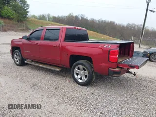 2018 Chevrolet Silverado 1500 LT with VIN 3GCUKREC2JG201754, listed as a IAAI auction lot 41944175 with 112,305 mi miles. Bid and sale history available at carsss.com. Image 3.