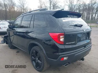 2019 Honda Passport EX-L with VIN 5FNYF8H5XKB024116, listed as a IAAI auction lot 42055543 with 68,641 mi miles and . Bid and sale history available at DreamBid. Image 3.