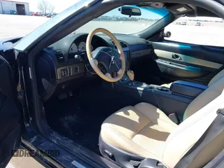 2004 Ford Thunderbird Deluxe z VIN 1FAHP60AX4Y103613, wystawiony jako IAAI lot #41962198 z przebiegiem 81 765 mil mil oraz . Historia ofert i sprzedaży dostępna na DreamBid. Obrazek 5.