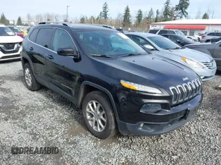 2014 Jeep Cherokee Latitude with VIN 1C4PJMCS0EW169696, listed as a IAAI auction lot 41647691 with 98,919 mi miles. Bid and sale history available at carsss.com. Image 1.