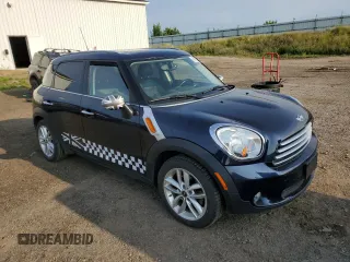 2012 MINI Countryman z VIN WMWZB3C57CWM05555, wystawiony jako Copart lot #65585065 z przebiegiem 120 493 mil mil oraz Czysty tytuł • Clean title. Historia ofert i sprzedaży dostępna na DreamBid. Obrazek 4.
