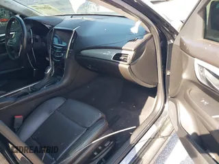 2013 Cadillac ATS Performance z VIN 1G6AC5S31D0125484, wystawiony jako IAAI lot #42357376 z przebiegiem 91 476 mil mil oraz . Historia ofert i sprzedaży dostępna na DreamBid. Obrazek 5.