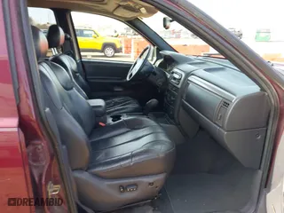 2001 Jeep Grand Cherokee Laredo with VIN 1J4GW48SX1C508609, listed as a IAAI auction lot 41780729 with 144,796 mi miles. Bid and sale history available at carsss.com. Image 5.