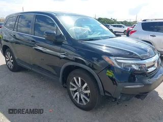 2020 Honda Pilot EX-L with VIN 5FNYF5H59LB014225, listed as a IAAI auction lot 41689776 with 90,994 mi miles. Bid and sale history available at carsss.com. Image 1.