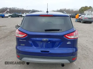 2013 Ford Escape SE z VIN 1FMCU9GX5DUD35239, wystawiony jako IAAI lot #41677245 z przebiegiem Nie podano mil oraz . Historia ofert i sprzedaży dostępna na DreamBid. Obrazek 16.